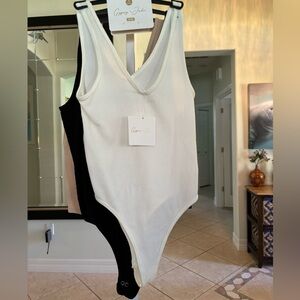 Bundle of 3 Bodysuits NWT Size S/M.